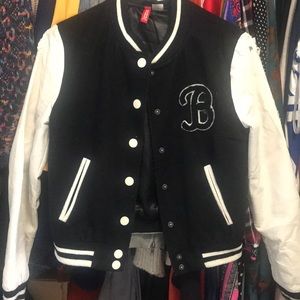 Black and white letterman jacket with ‘B’